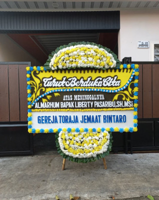 Papan Bunga Duka di Legok Suka Maju